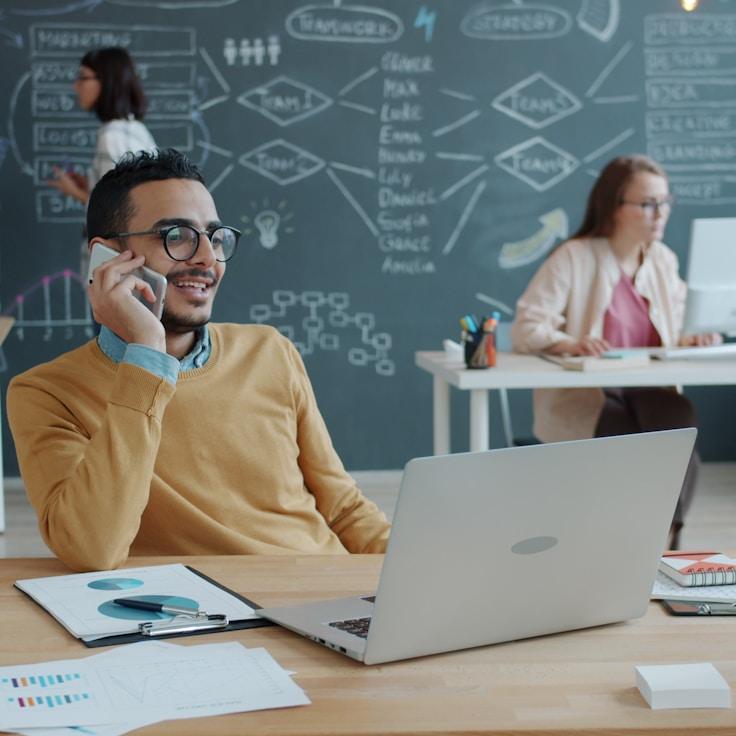 Mobile app development process showing collaborative team environment